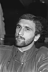 A black and white photo of a footballer